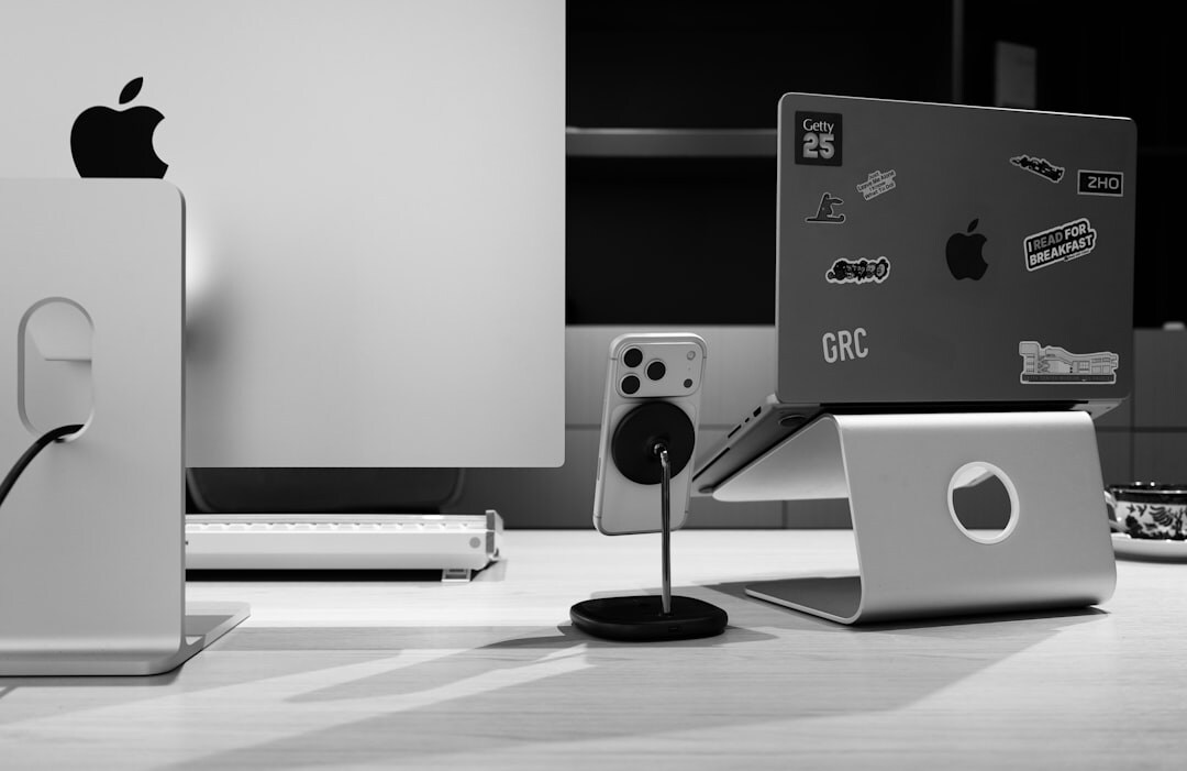 Laptop and notebook on a modern desk